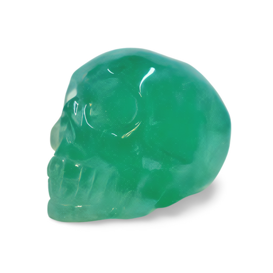 Green crystal skull on a white background