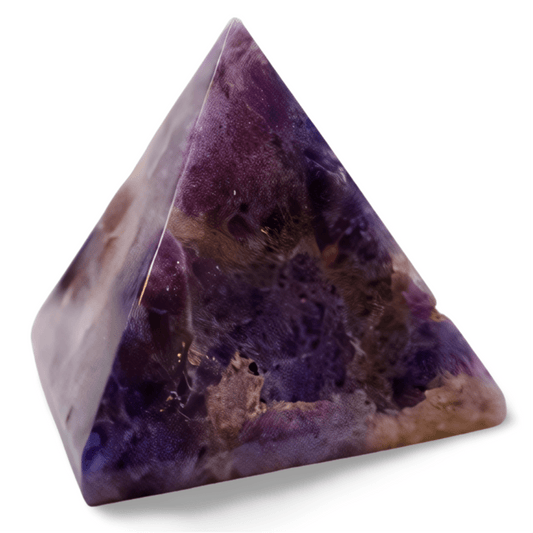 Triangular purple stone on a white background